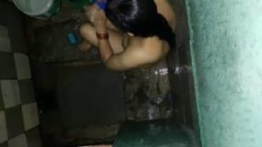 Hot Village Bhabhi Caught Bathing Using Spy Camera