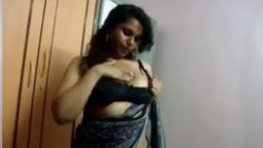 Indian wife strips and exposes huge boobs for lover