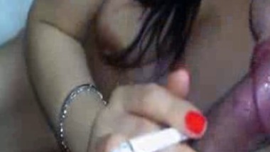 Hot and Sexy Indian babe giving blowjob and smoking