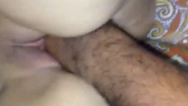 Indian guy fingering his wife then fucking on couch