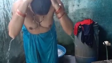 Hot Desi52 video of my aunty taking a shower and she has got a humongous boobs