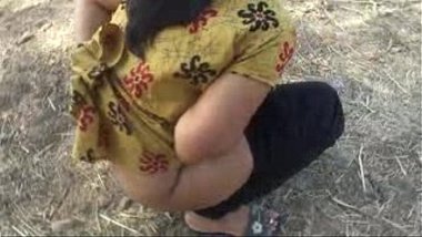 Indian Bhabhi Squats And Pees In Public