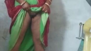 Hubby films his Desi wife when she lifts dress to show XXX pussy