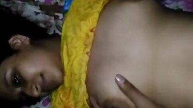 Guy touches Indian babe's boobs having oral sex in front of the camera