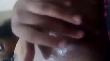 Porn video of the excited Desi enchantress masturbating wet vagina