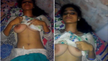 Indian fellow plays with GF's juicy XXX tits until she notices camera