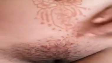 Desi woman shows hairy XXX hole besides tattoos on sexy tits and tummy