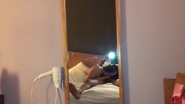 Long-haired Indian gal polishes lover's XXX dick in front of mirror