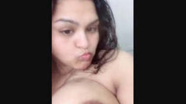 Sexy Teen girl sucking her Big boobs