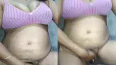 Chesty Indian woman before sex actively fingers her trimmed XXX pussy