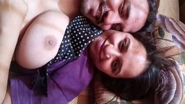 Man lies next to Indian with naked XXX boobs going to punish her