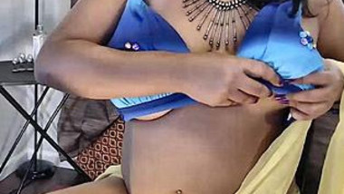 Indian female in the yellow sari hides her nipples with hands in porn video