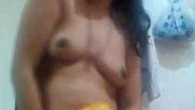 Indian wife takes clothes off and remains naked exposing small boobs