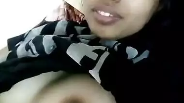 sexy desi girl showing her boobs on bed video