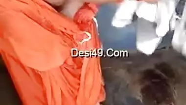 Husband films amateur porn video of the Desi wife in orange dress