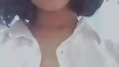 Girl opening shirt and round big boobs shown