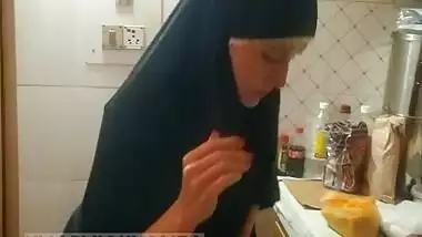 Pakistani wife in hijab Smoking and Showing Ass hole at Kitchen