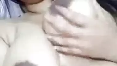Big boob Desi girl sucking her boobies