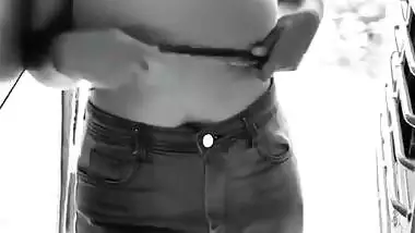 Girl shows her boobs on a running train for fun