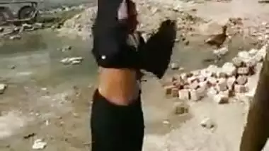 Brave Paki woman flashes XXX snatch not noticing buddy with camera