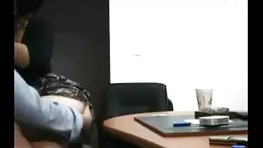 Hidden cam catches a mature slut enjoying office sex