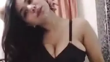 Beautiful girl showing her melons while listening hindi sensual song
