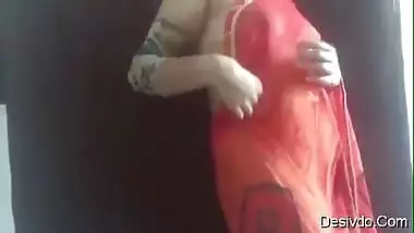 hot sexy desi wife simran bhabhi showing boobs and ass in red saree