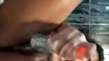 Horny bitch masturbating pussy with bottle video MMS