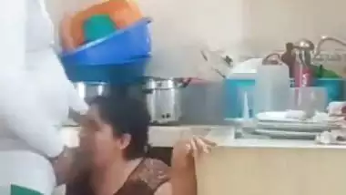 Giving Blowjob to young devar in kitchen