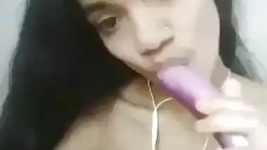 Skinny Desi girl masturbating pussy with brinjal