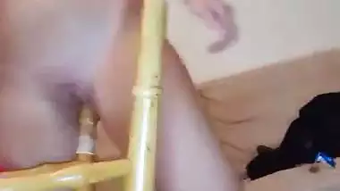 Crazy wild girl fucks her pussy with a chair leg