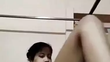 Cute Indian babe makes sex fans see her saggy XXX boobs via webcam