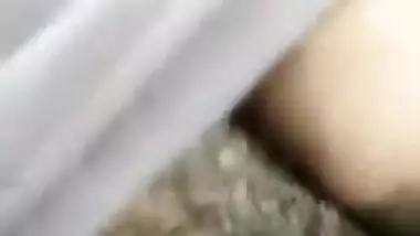 Man wears a sex condom and shoves XXX instrument into hairy Desi pussy