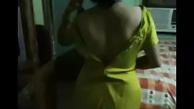Aunty strips clothes to showcase busty assets