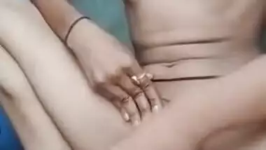 Possessor of small breasts diligently washes her Indian pussy