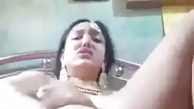 Newly married nude desi lady fucks her pussy with a banana
