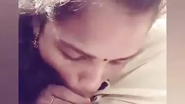Young Tamil girl sucking her lover’s dick