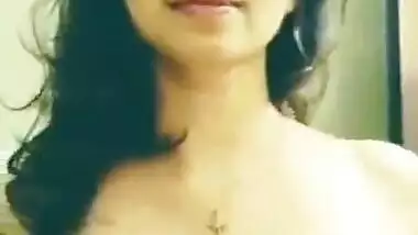 Hot desi girl pressing her boobs