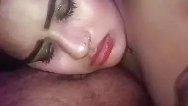Desi wife enjoys blowjob by lying on husband tummy