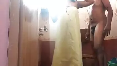 Amateur Indian sex video where man fucks wife from behind in bathroom