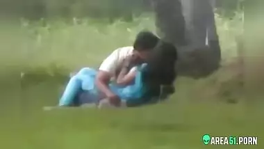 Beautiful Indian wife in blue saree with her lover in public park