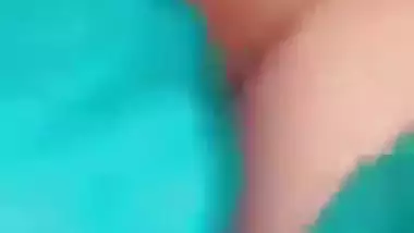 Horny girl squeezes her boobs and fingers her hairy pussy