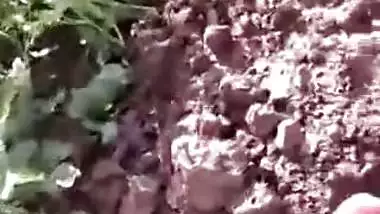 Hot Desi couple caught fucking outdoor in a ravine, MMs recorded by a voyeur