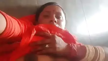 Desi Village bhabhi making video for lover, showing boobs and pussy