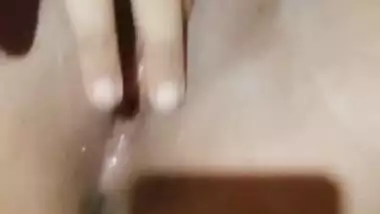 Hot girl fingering her pussy