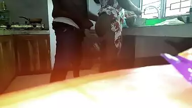 Horny man comes to Indian wife and satisfies XXX needs in the kitchen