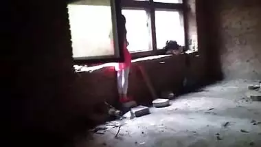 Masturbates on a construction site with a girl